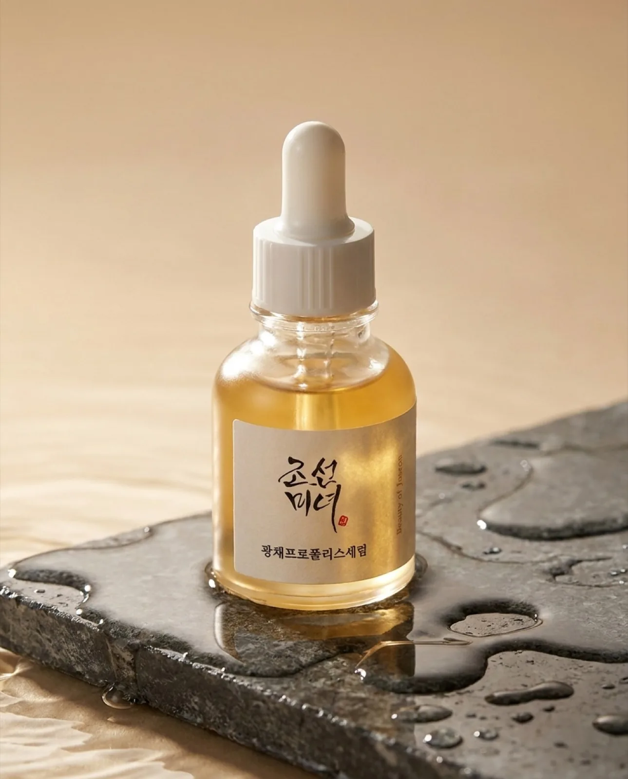 Studio packshot of a serum bottle produced for an ad campaign